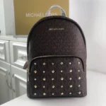 MK Rhea printed studded shoulder bag Model: 2106: Size: 26m Height: 32 Width: 14