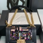Chanel slip gold buckle